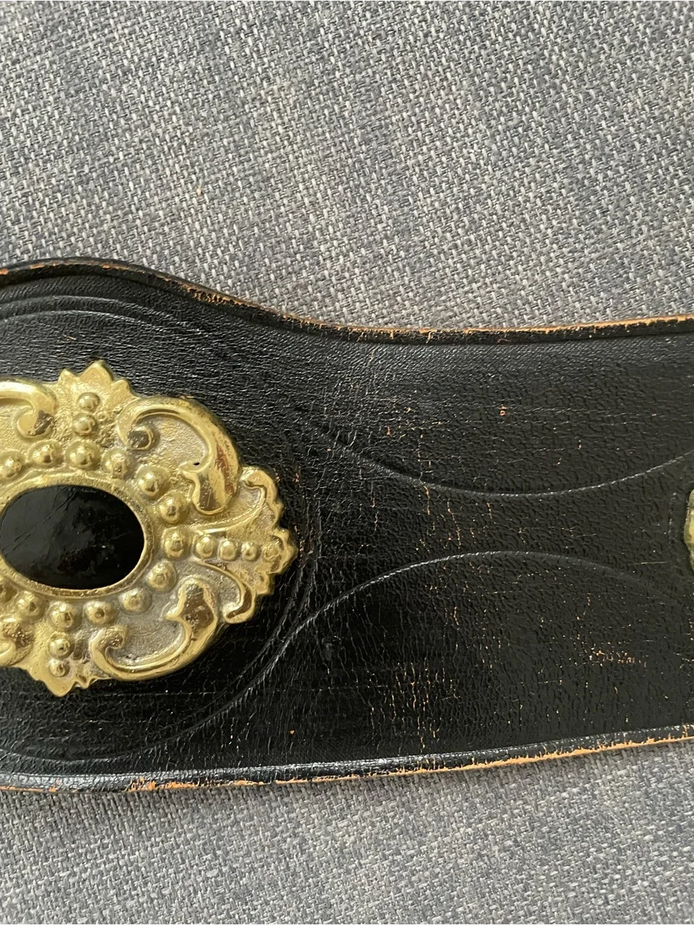 Vintage black leather with metal charms